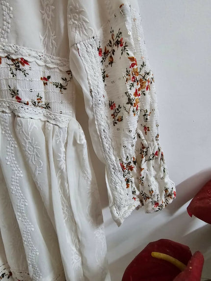 White dress with flower design of L size