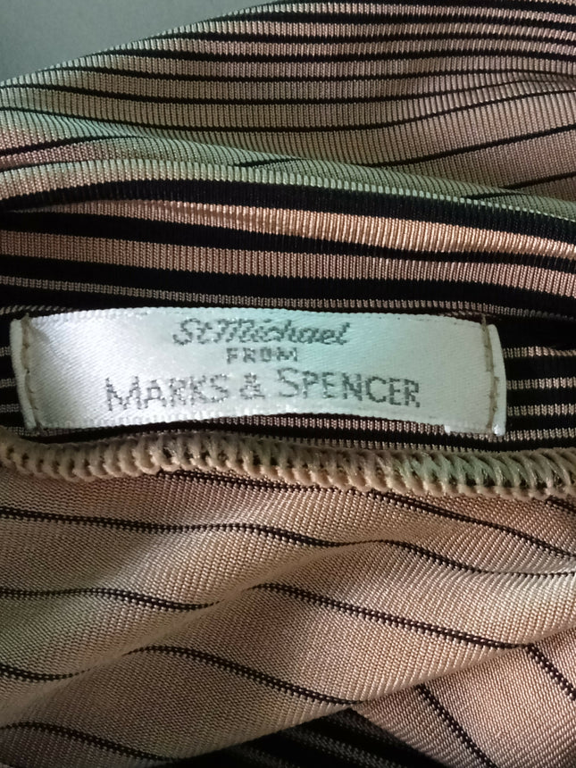 Marks and Spencers sleeveless turtleneck top