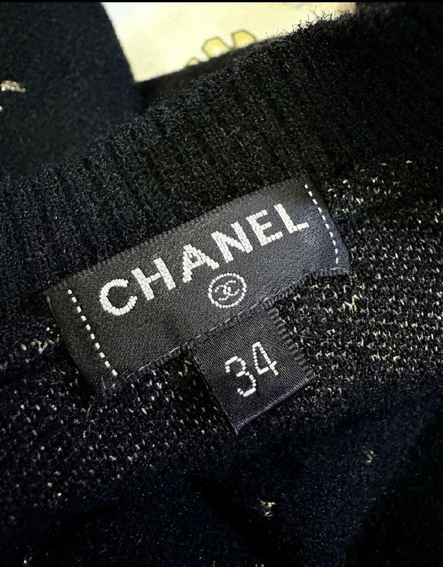 Authentic Pristine✨ CHANEL black cupro blend CC starburst logo lurex long sleeve sweater FR36!