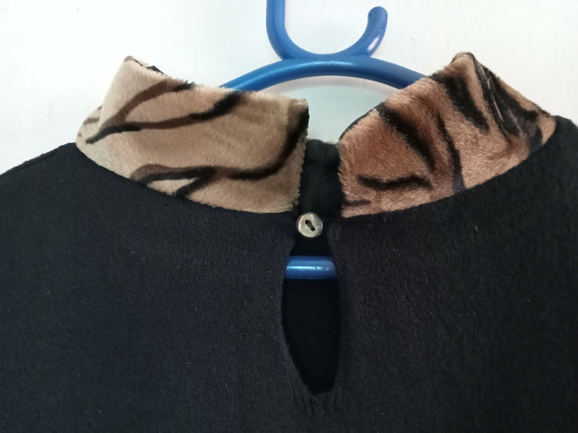 Women's Marks and Spencers black sleeveless tank top with tiger print mock neck detail